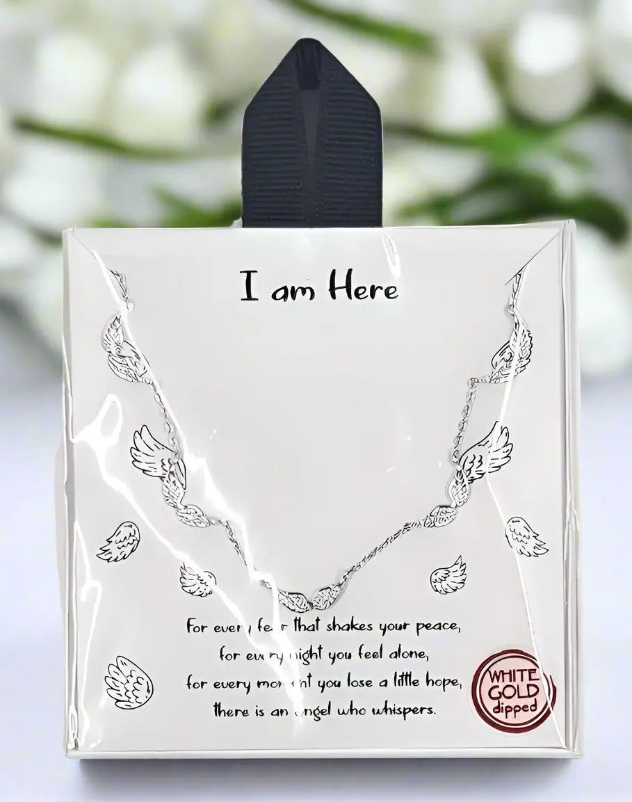 Angel wing necklace for someone grieving Round The Mountain Gift Shop