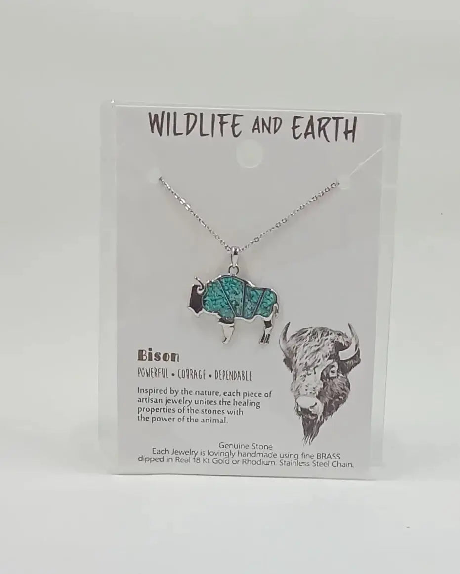 Animal necklace in the shape of a bison and filled with turquoise gemstones