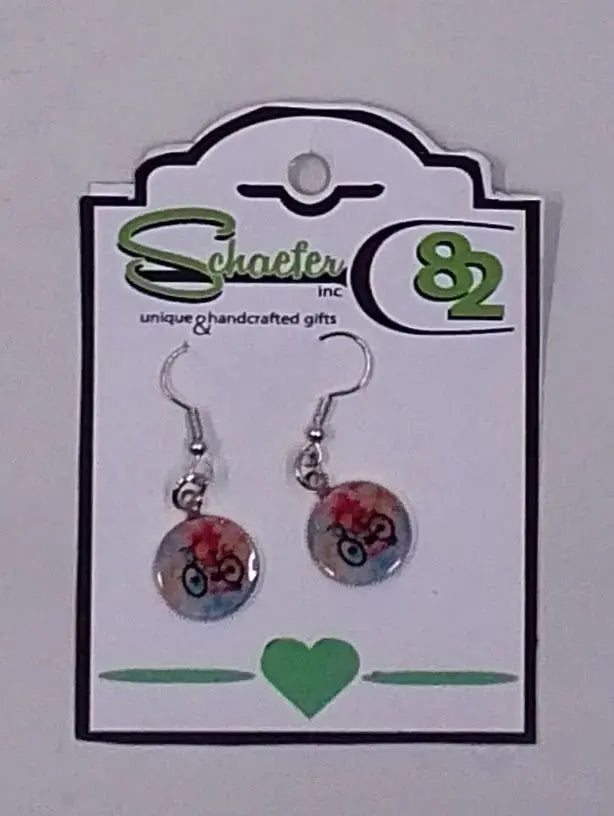These colorful and fun earrings are small but have a rainbow like background with a bike in the forefront.