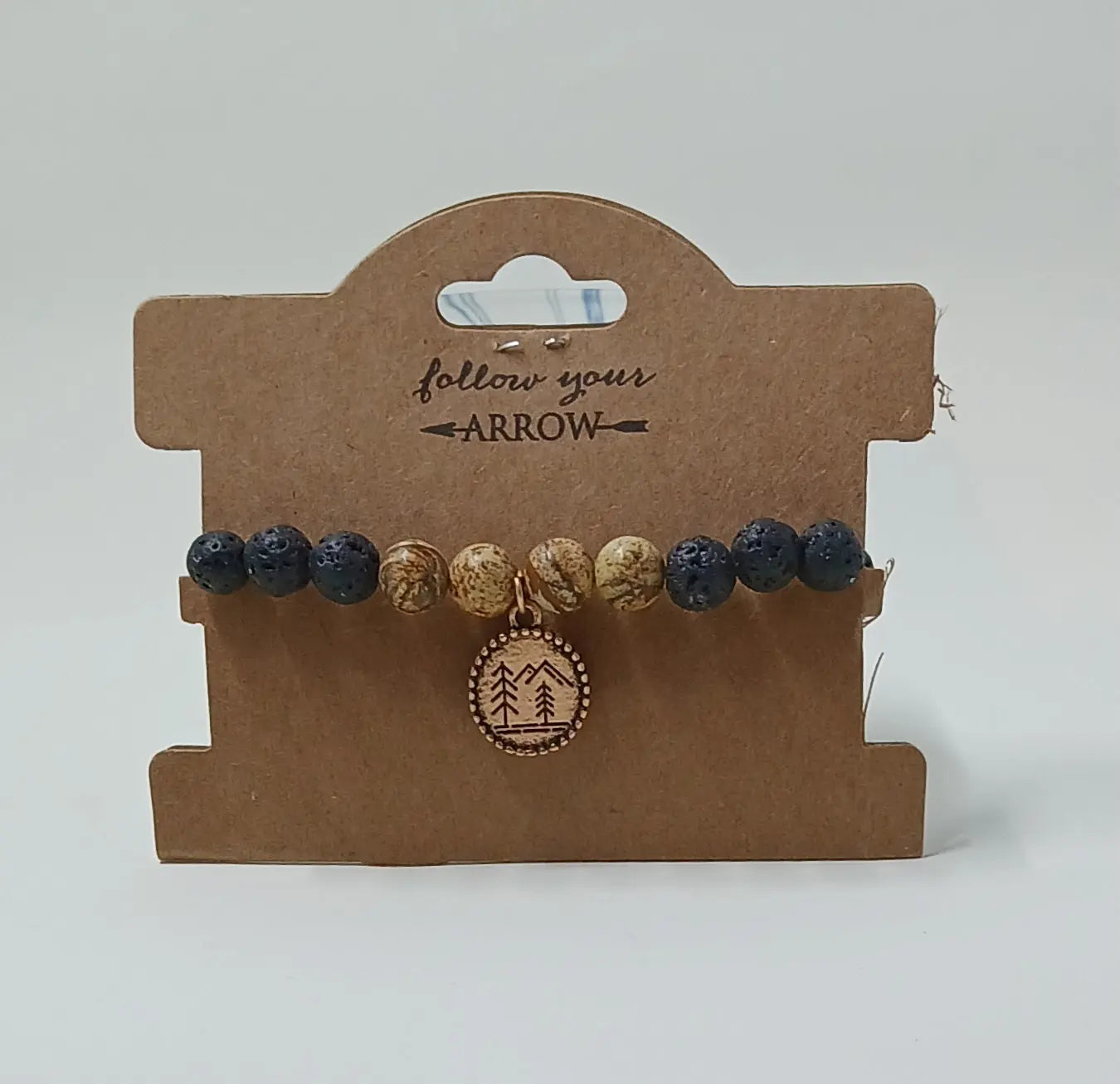 lava beads with trees and mountains Round The Mountain Gift Shop