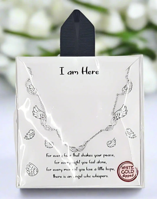 Angel wing necklace for someone grieving Round The Mountain Gift Shop