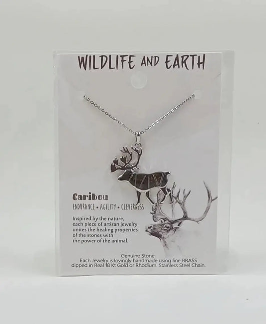 Animal necklace: made of brass, dipped in rhodium is in the shape of a caribou and filled with tigers eye gem stones.