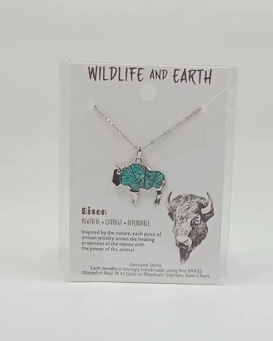 Animal necklace in the shape of a bison and filled with turquoise gemstones