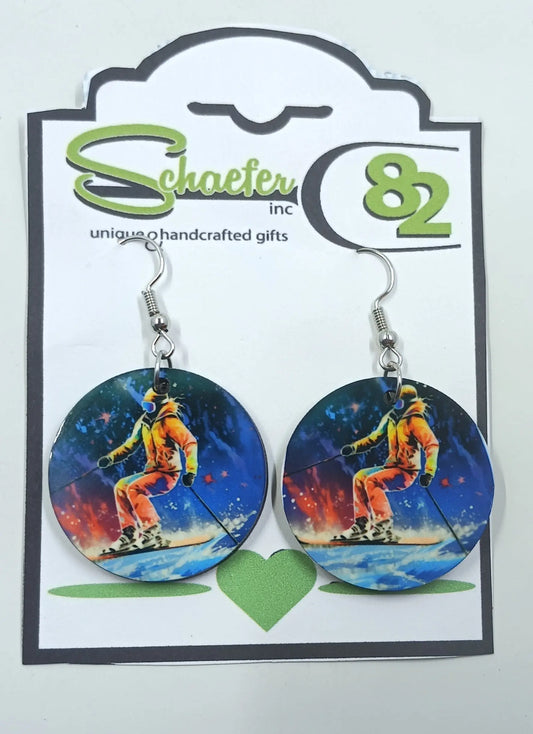 Our skiing earrings are a great addition to any skiers wardrobe. They are colorful and vibrant and has a skier actively going down the mountain. 